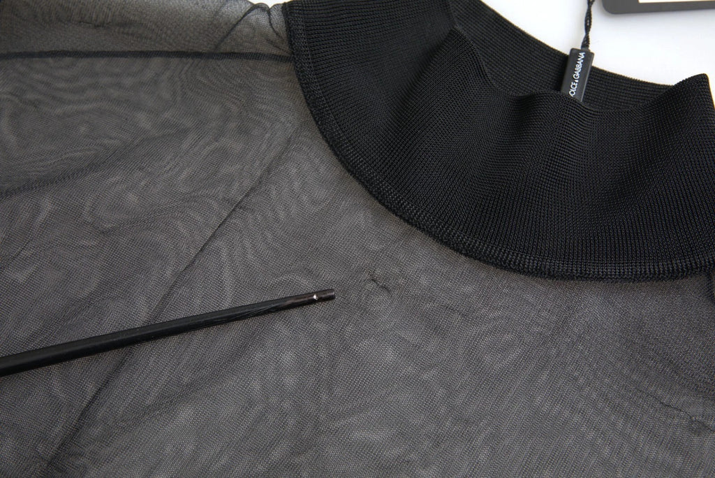 Chemise noire en mesh transparent Dolce & Gabbana à col roulé, tissu léger et élégant, ajustée et sophistiquée.
