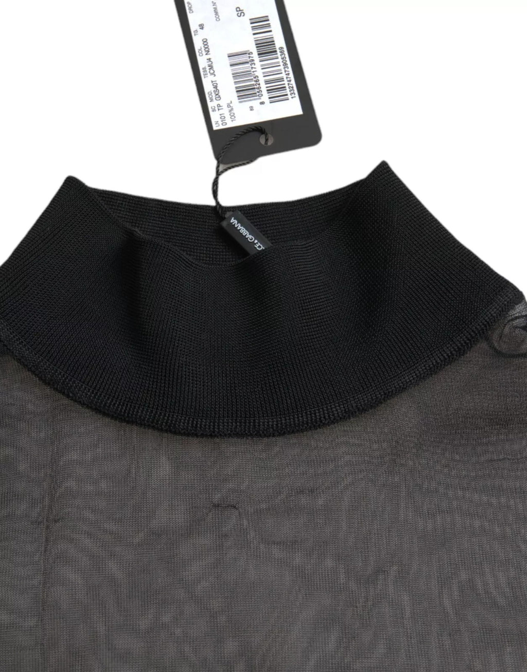 Blouse en dentelle noire Dolce & Gabbana à col roulé en mesh transparent, élégante et raffinée.