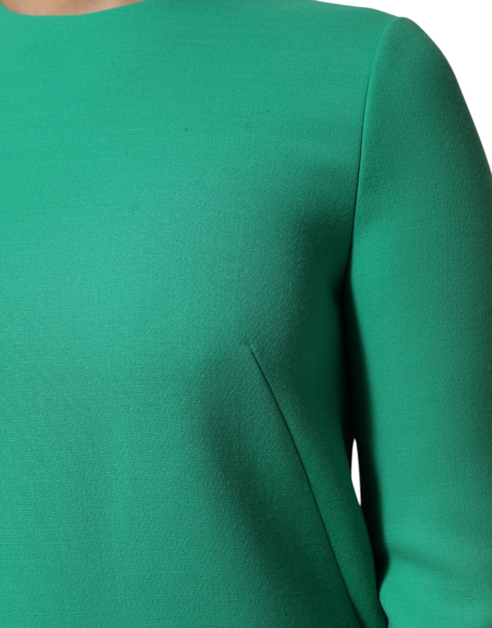 Robe verte en viscose et acétate Dolce & Gabbana à manches longues et style mini, portée élégante.