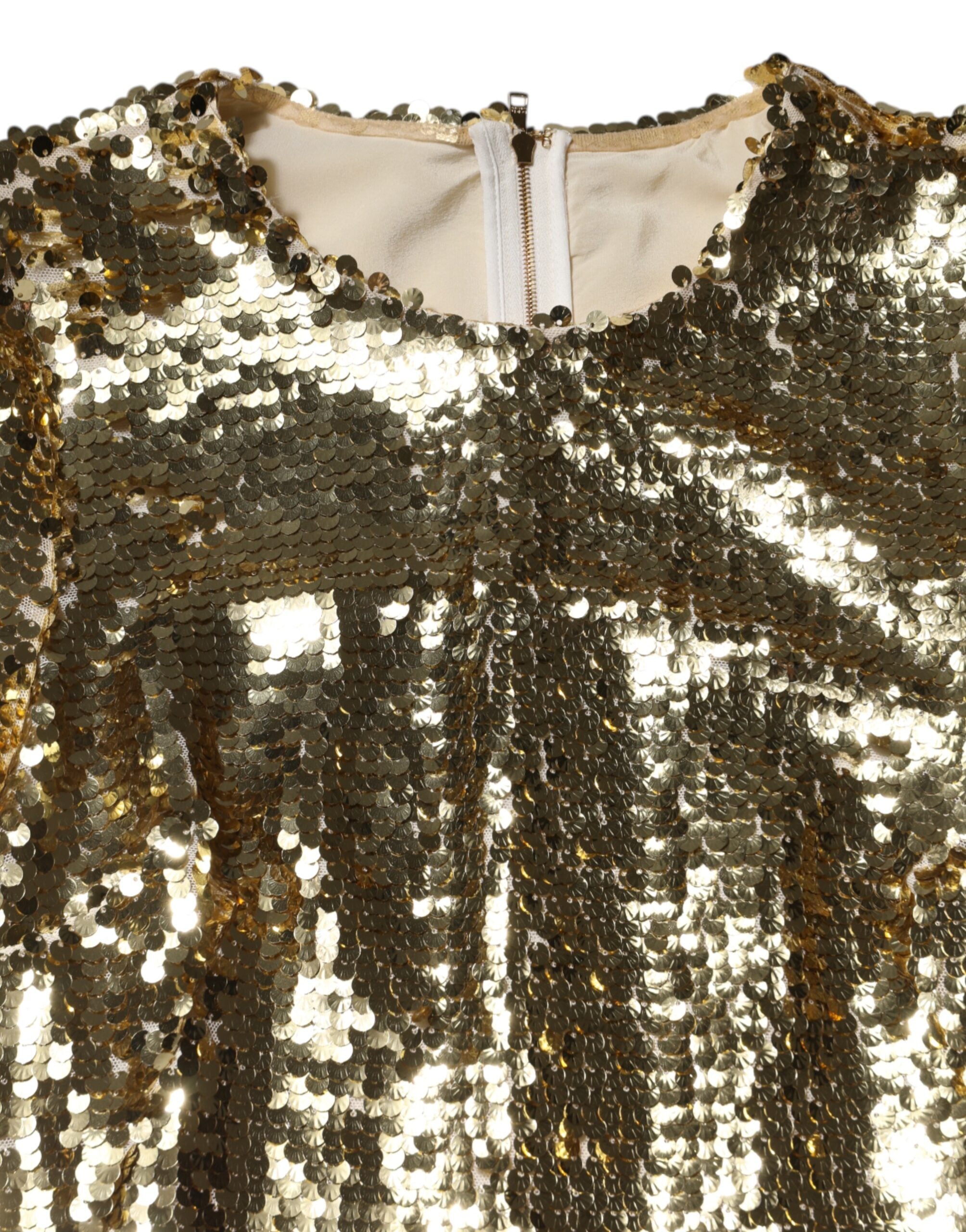 Robe courte dorée Dolce & Gabbana à sequins à manches longues, élégante et brillante, pour une allure sophistiquée.
