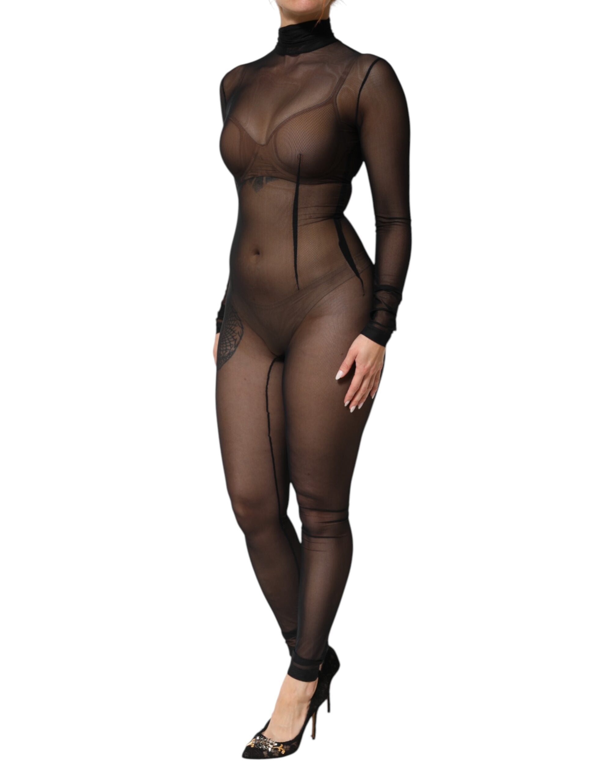 Combinaison noire en mesh transparent à manches longues de Dolce & Gabbana, vêtement élégant et sophistiqué.