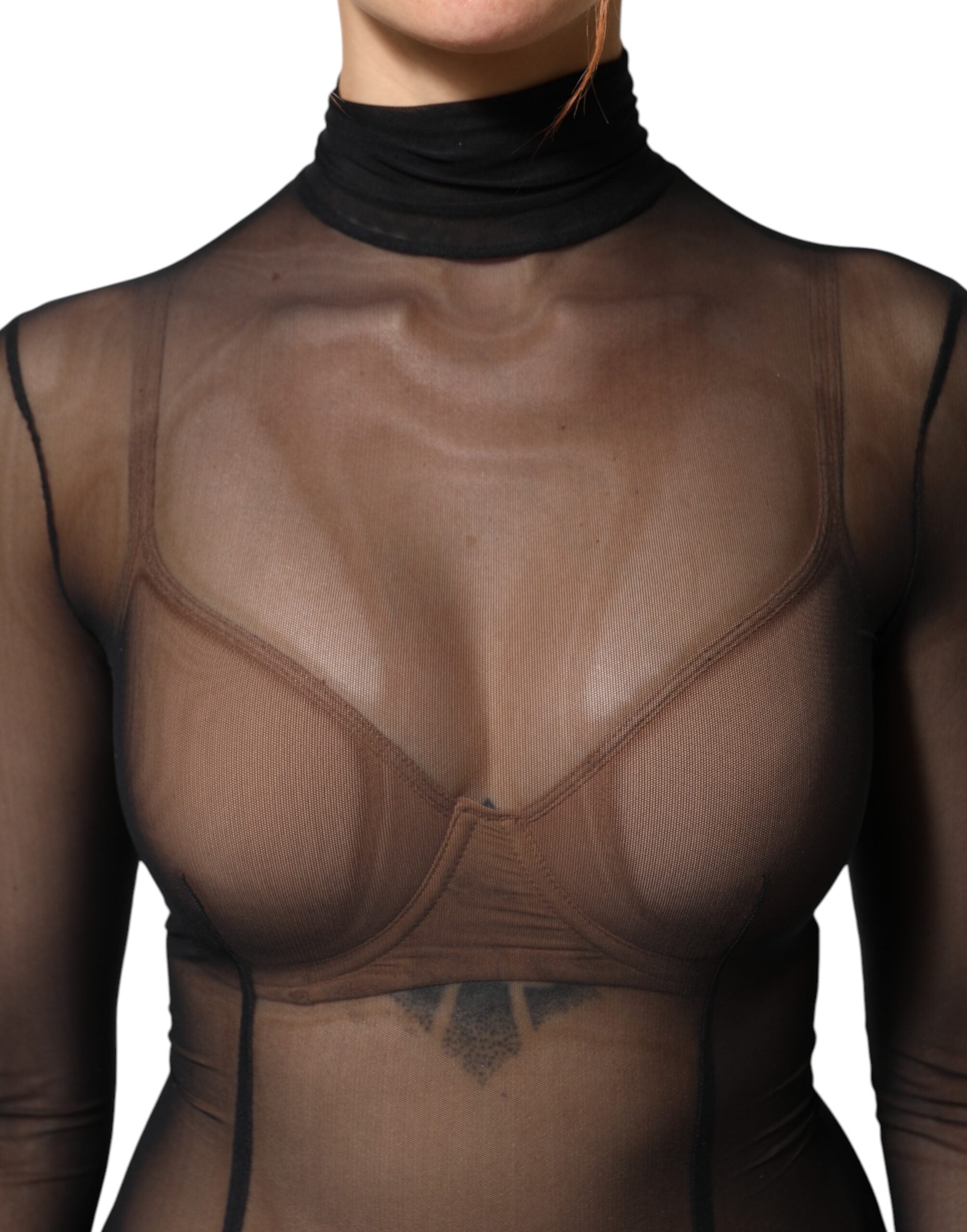 Combinaison longue en mesh noir Dolce & Gabbana, manches longues, vêtement moulant et transparent, style élégant et sophistiqué.