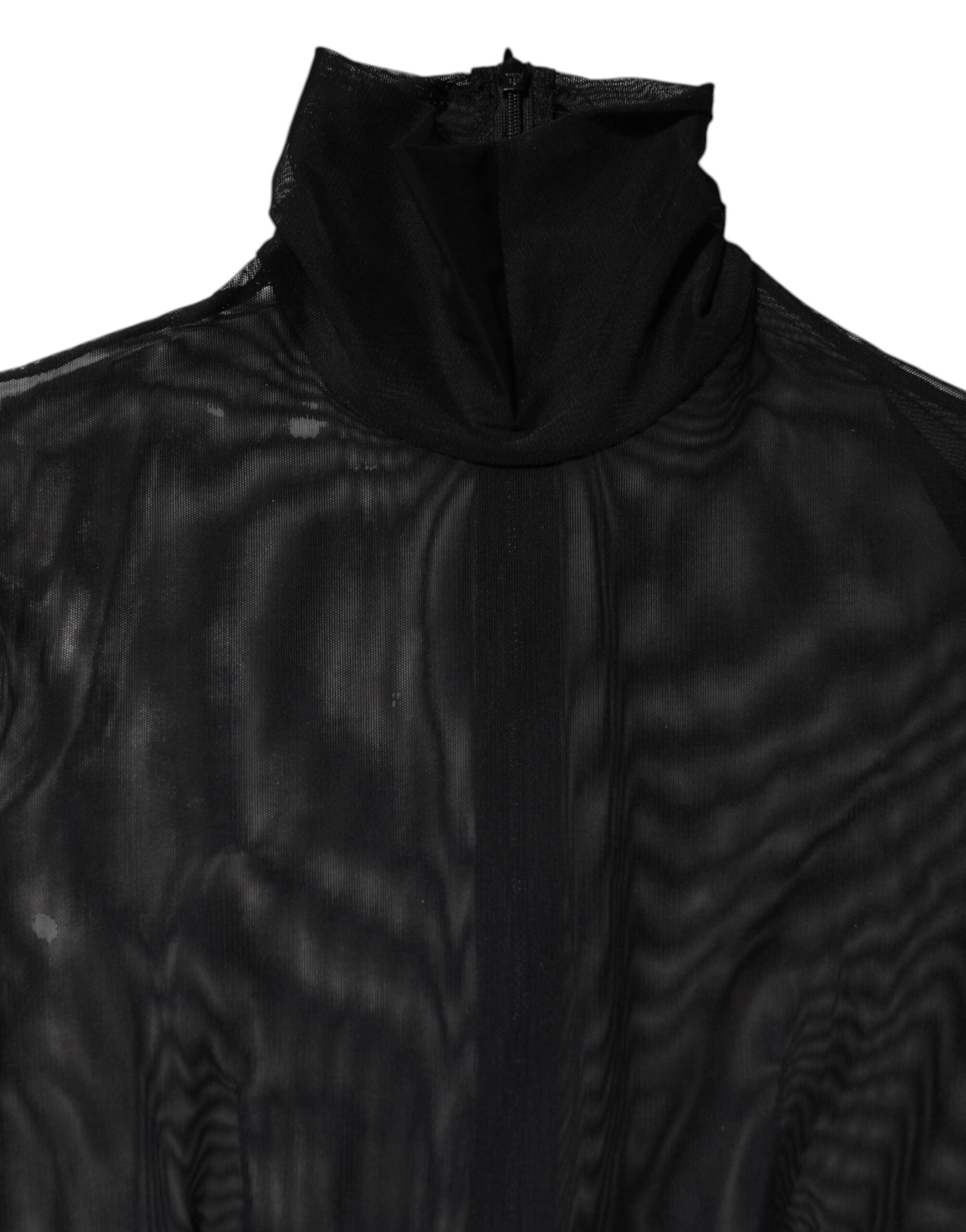 Combinaison en résille noire Dolce & Gabbana à manches longues et col en V, élégante et transparente, vêtement de mode féminine.