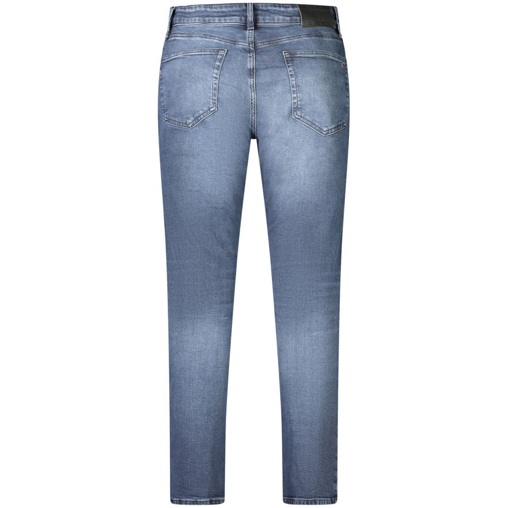 Jeans homme en coton Tommy Hilfiger bleus, coupe classique, avec ceinture et poches visibles sur l'image.