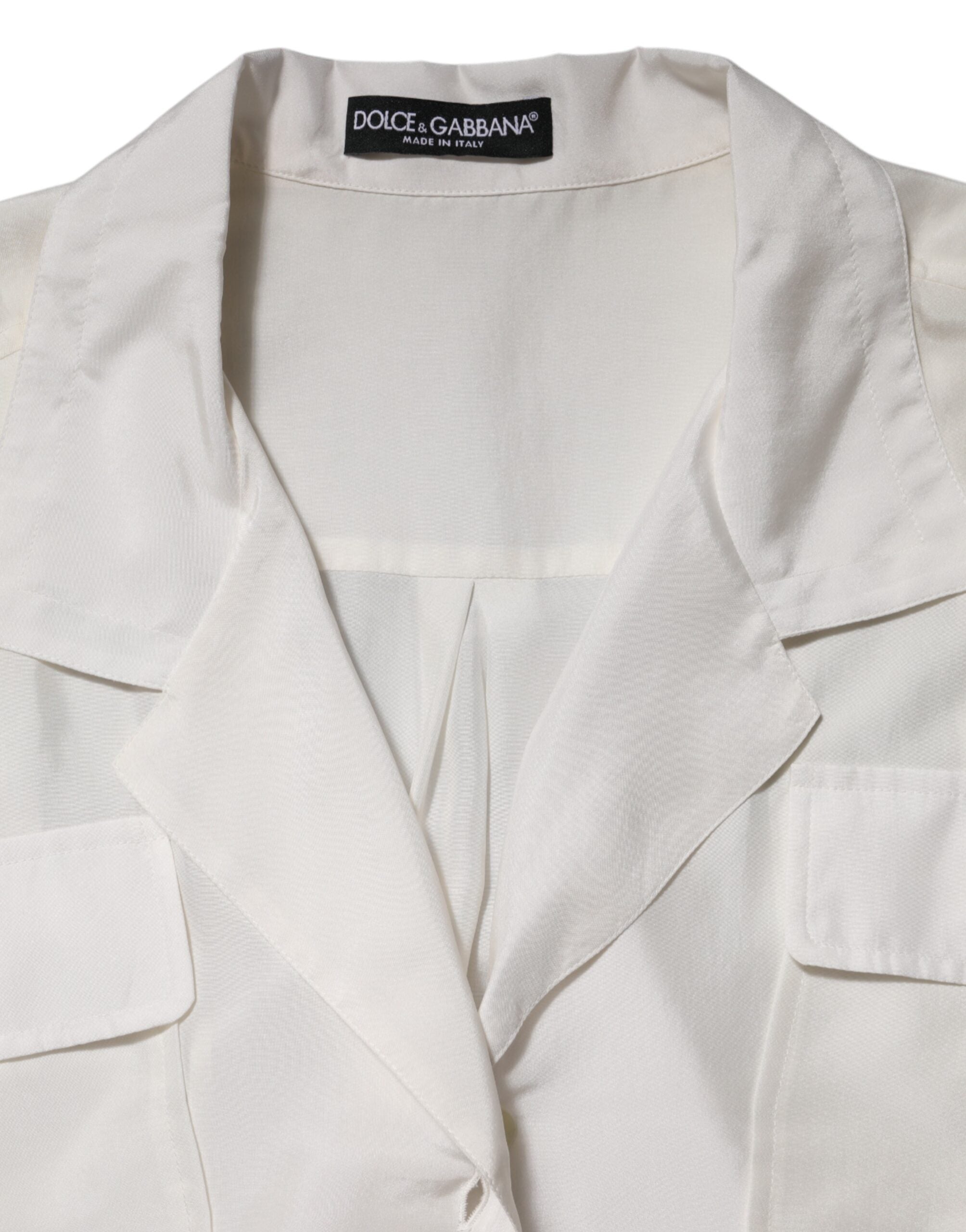 Blouse blanche en soie Dolce & Gabbana à col, manches 3/4, élégante et fluide, vue de face.