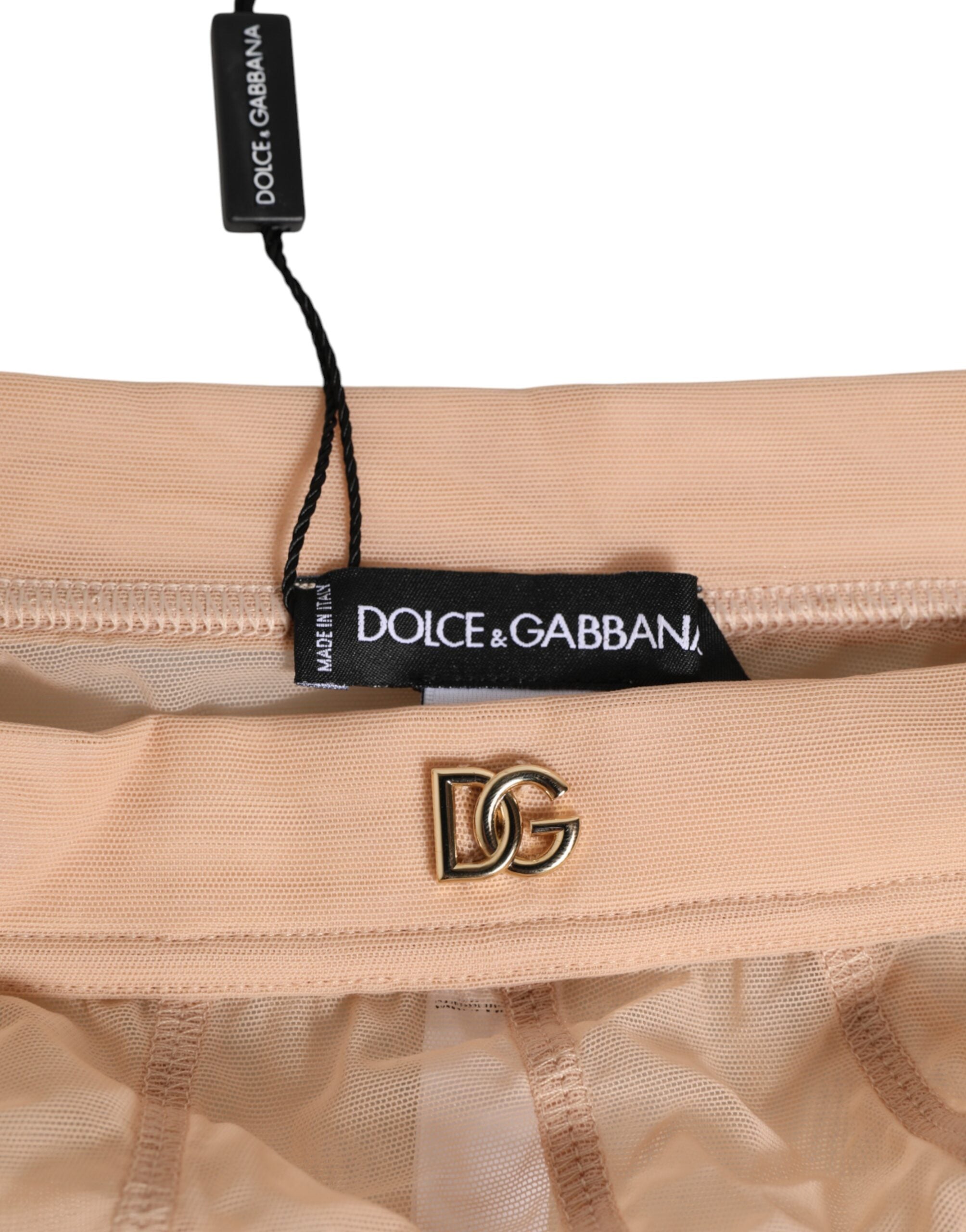 Culotte haute beige en mesh transparent de Dolce & Gabbana, sous-vêtements féminins élégants et confortables.