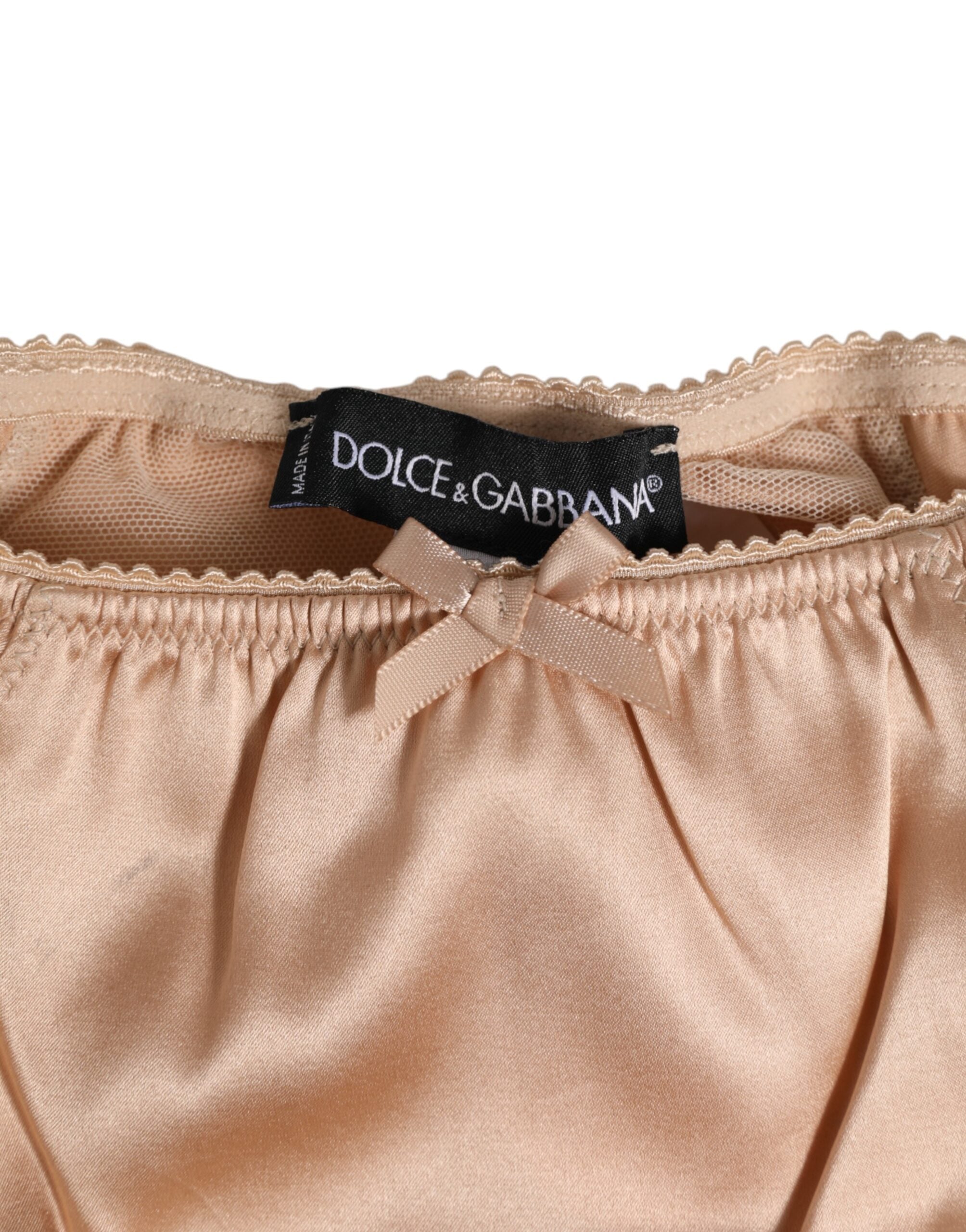 Sous-vêtements en satin de soie beige nude Dolce & Gabbana avec ruban en dentelle et nœud élégant.