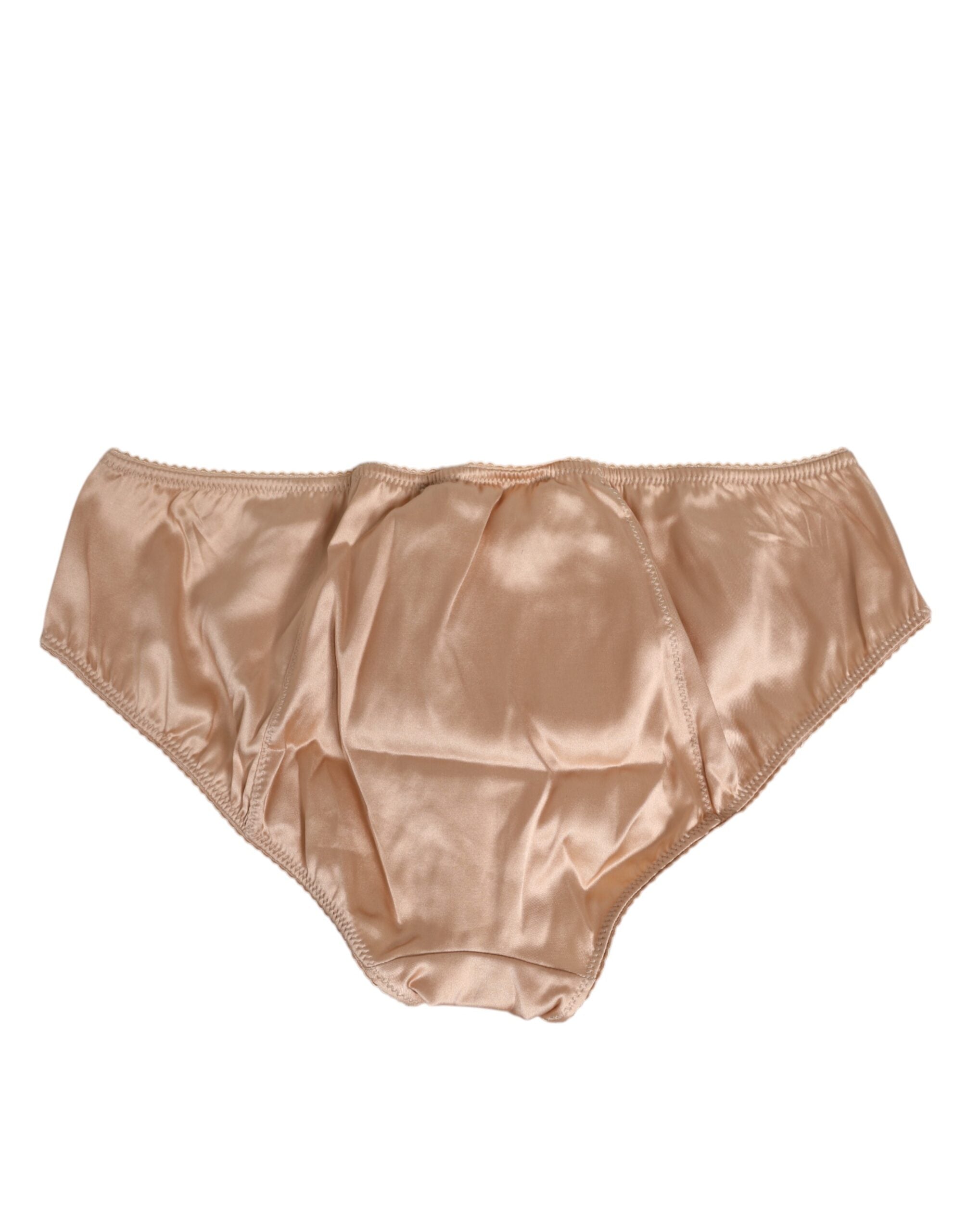 Sous-vêtements en satin beige nude Dolce & Gabbana avec nœud en soie et bordure en dentelle élégante.
