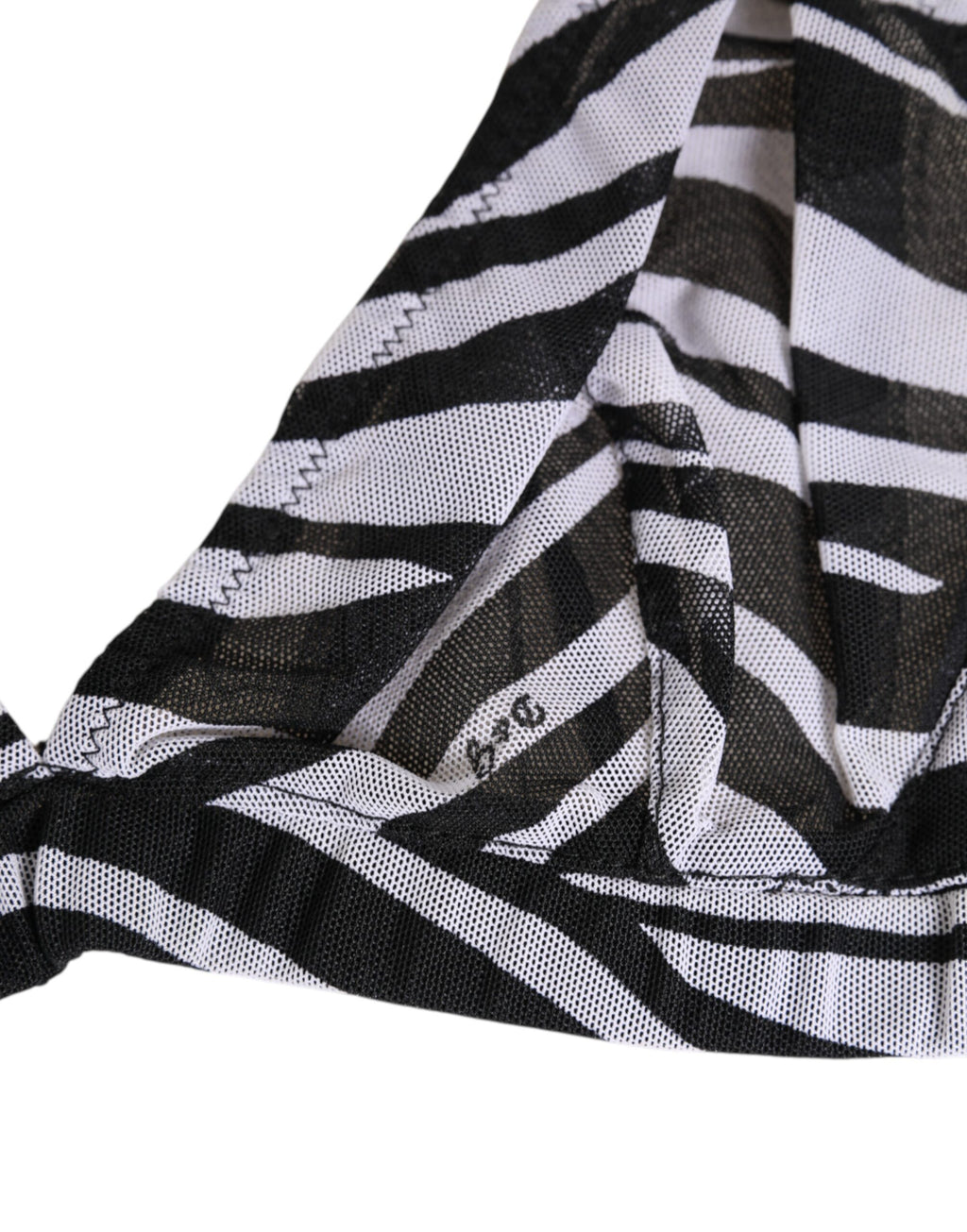 Brassière en résille transparente Dolce & Gabbana à imprimé zèbre noir et blanc, style élégant et audacieux.