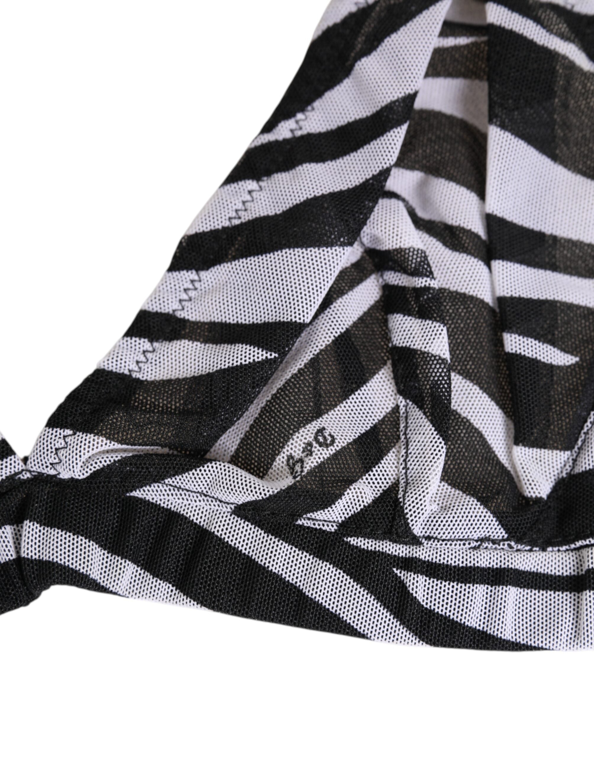 Brassière en résille transparente Dolce & Gabbana à imprimé zèbre noir et blanc, style élégant et audacieux.