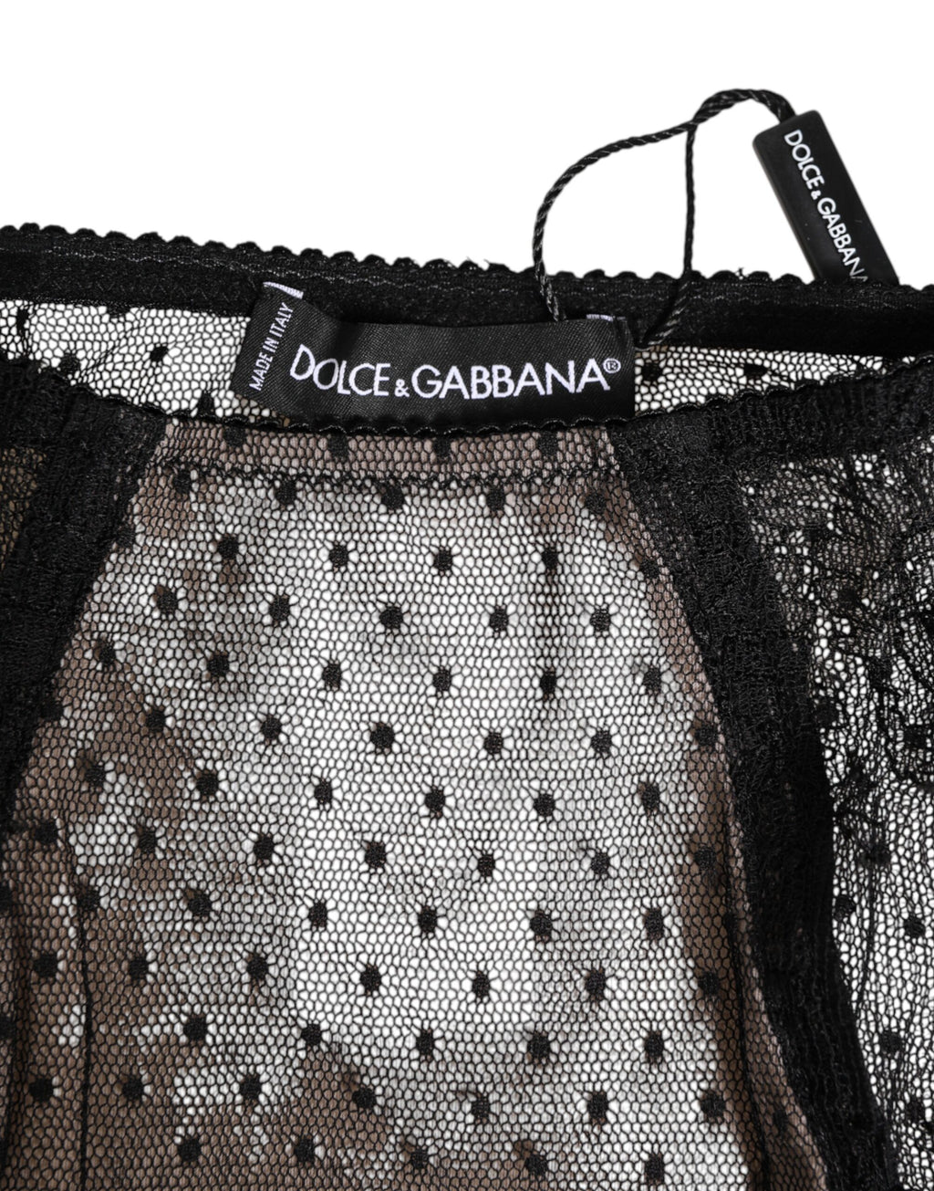 Sous-vêtements noir en dentelle transparente à pois, taille haute, de la marque Dolce & Gabbana.