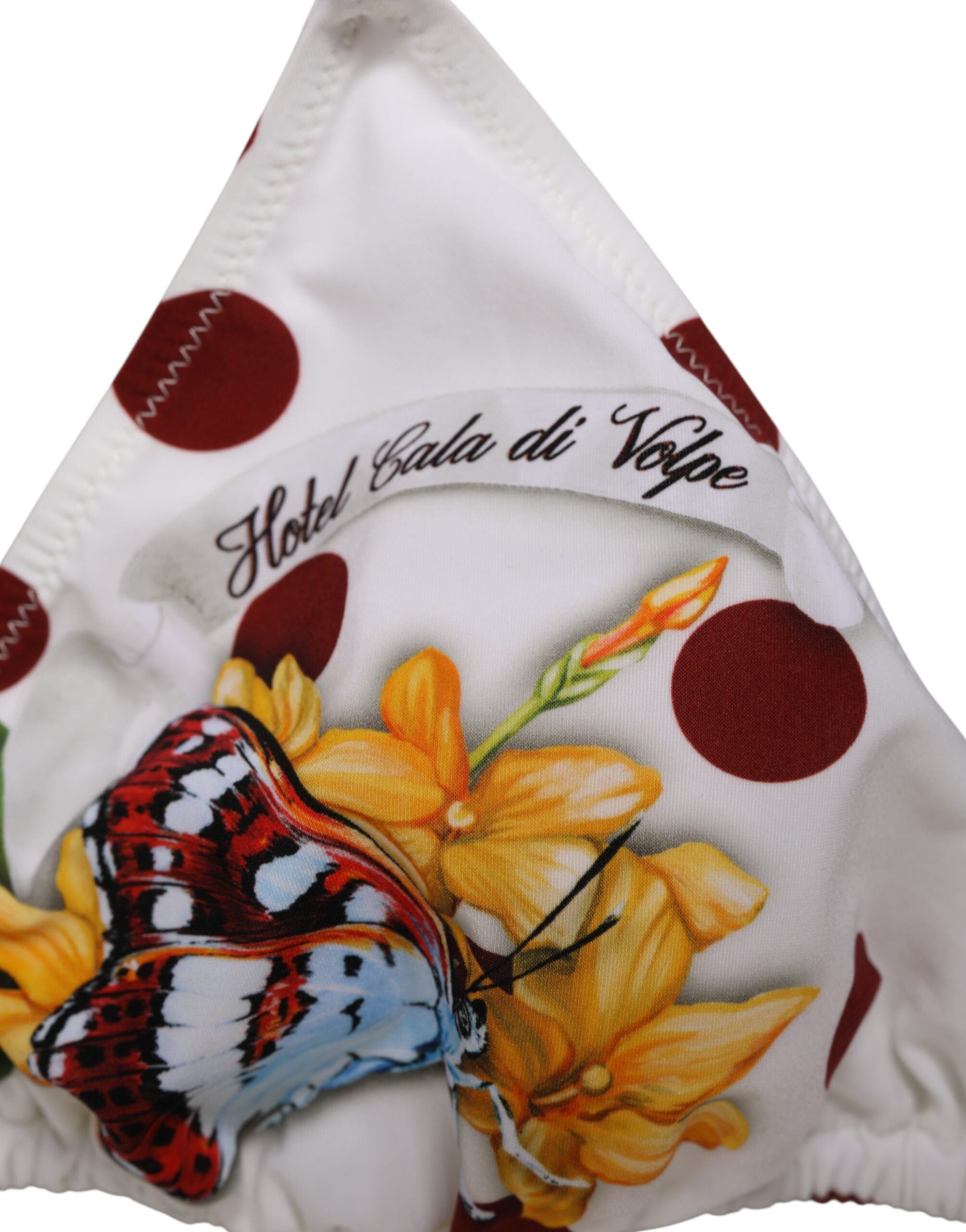 Triangle en soie Dolce & Gabbana blanc à pois rouges et imprimé floral, style élégant et féminin.