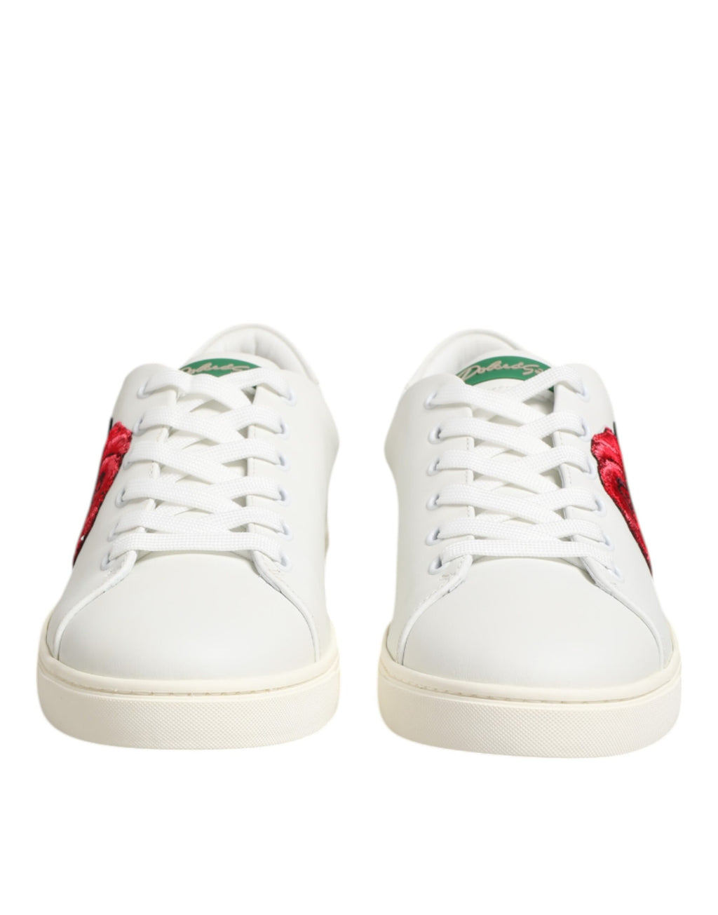 Chaussures basses en cuir blanc Dolce & Gabbana avec broderie de rose, style élégant et sophistiqué.