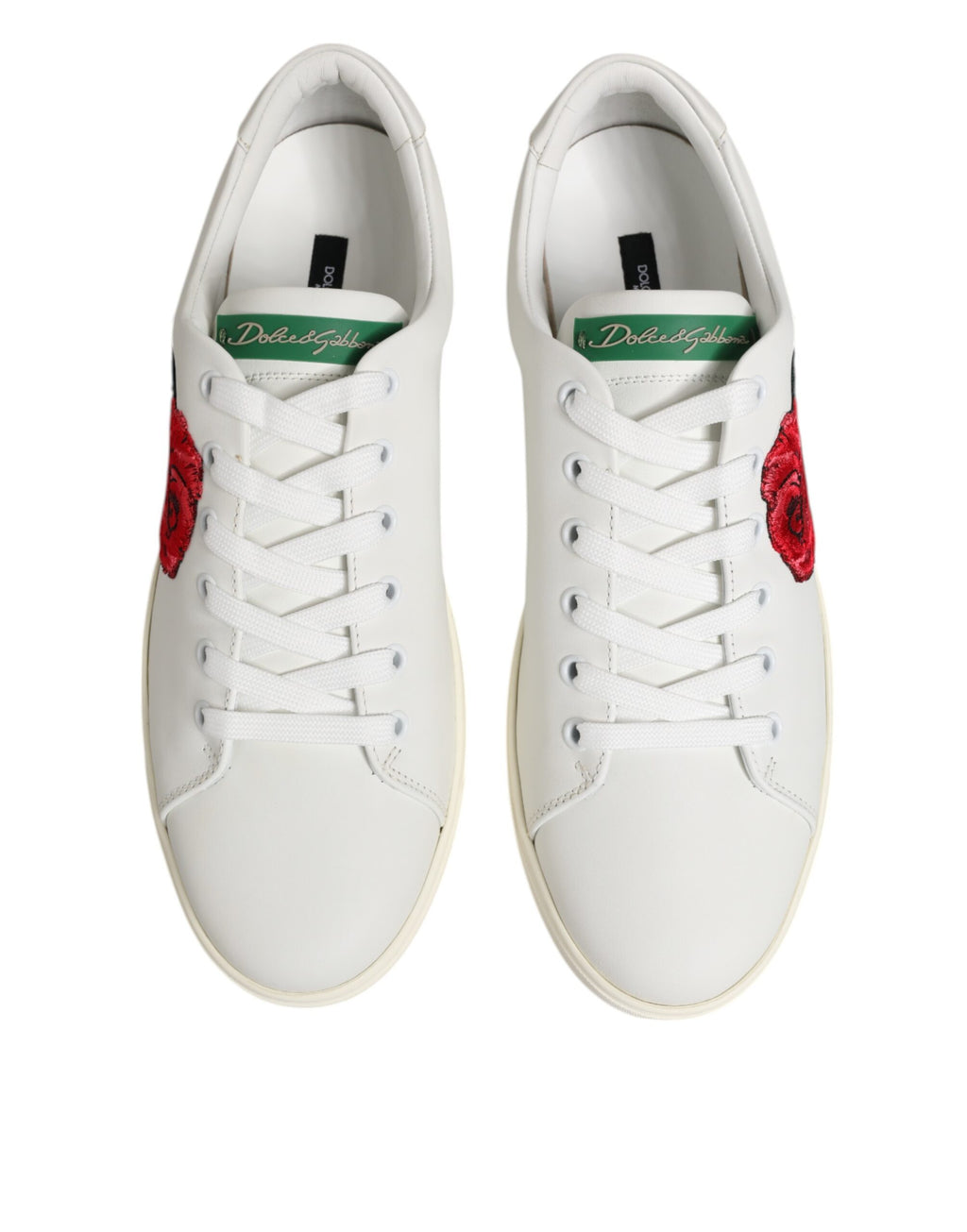 Chaussures basses en cuir blanc Dolce & Gabbana avec broderie de rose et détails élégants.