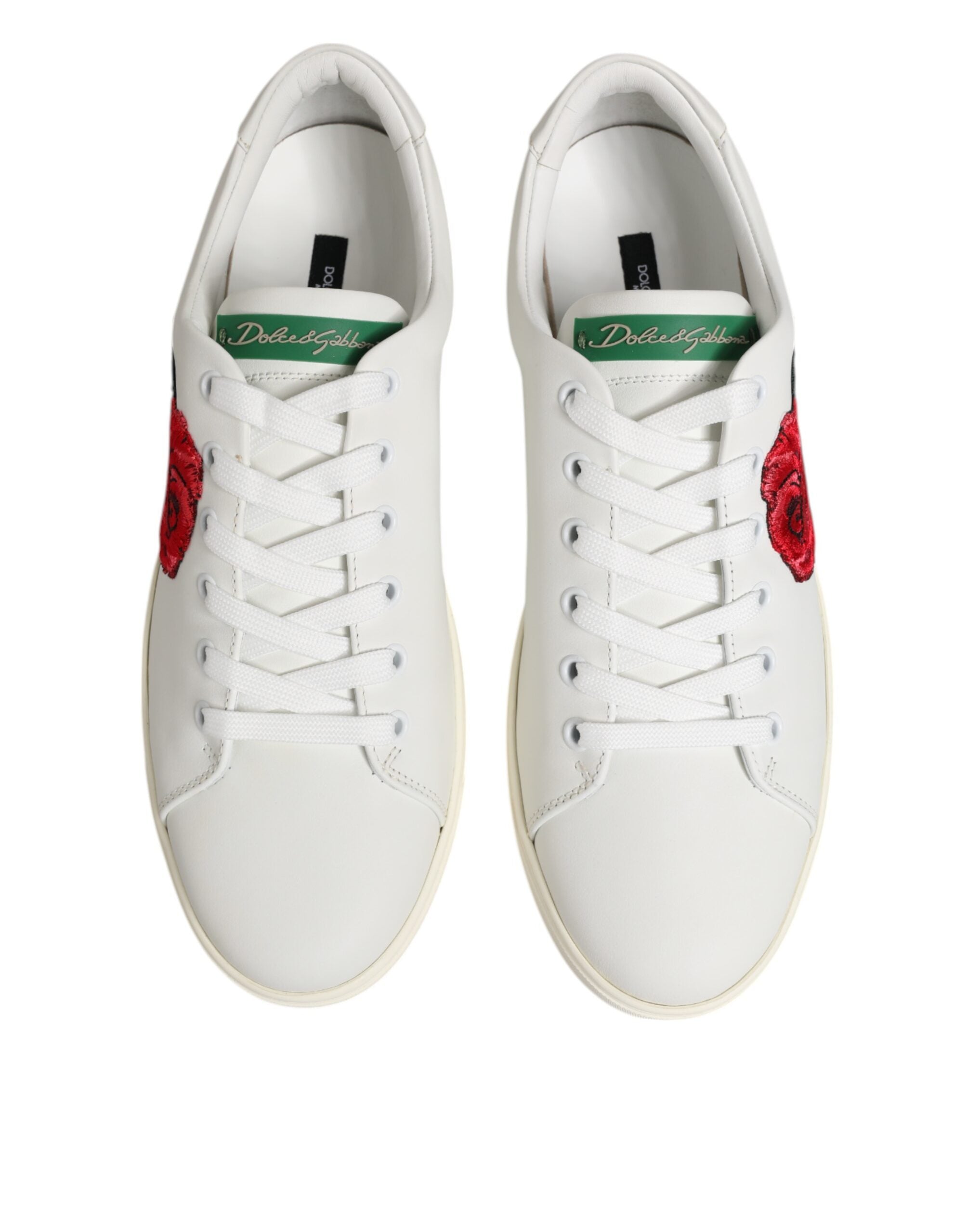 Chaussures basses en cuir blanc Dolce & Gabbana avec broderie de rose et détails élégants.