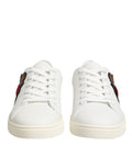 Chaussures sneakers en cuir blanc Dolce & Gabbana avec patch en forme de cœur sacré, design élégant et détails raffinés.