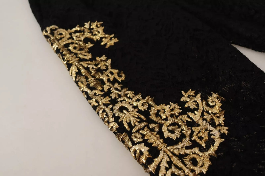 Shorts Dolce & Gabbana en dentelle noire avec détails dorés style baroque, pièce spéciale élégante.