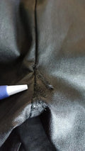 Pantalon noir en cuir avec taille élastique de Dolce & Gabbana, style élégant et sophistiqué, visible en image.
