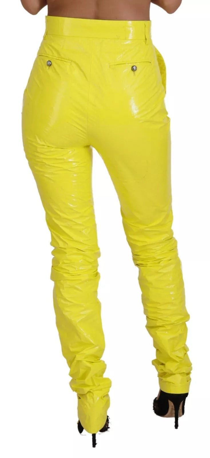 Pantalon jaune taille haute skinny pour femmes de la marque Dolce & Gabbana, visible en détail sur l'image.