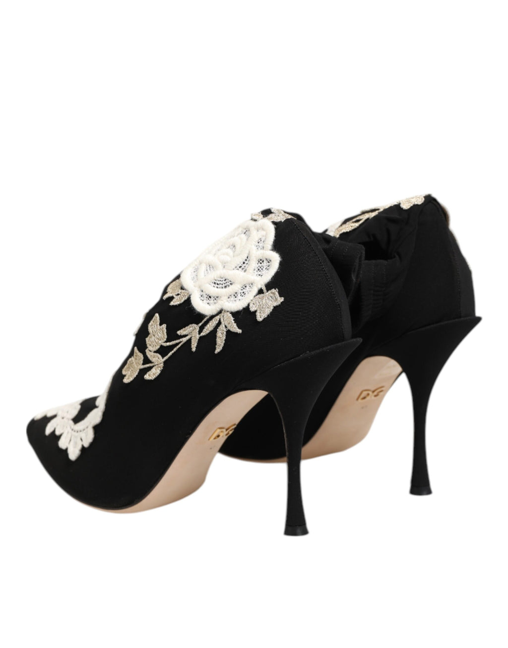 Bottes stilettos Dolce & Gabbana en jersey noir et blanc brodé, chaussures élégantes avec design sophistiqué.