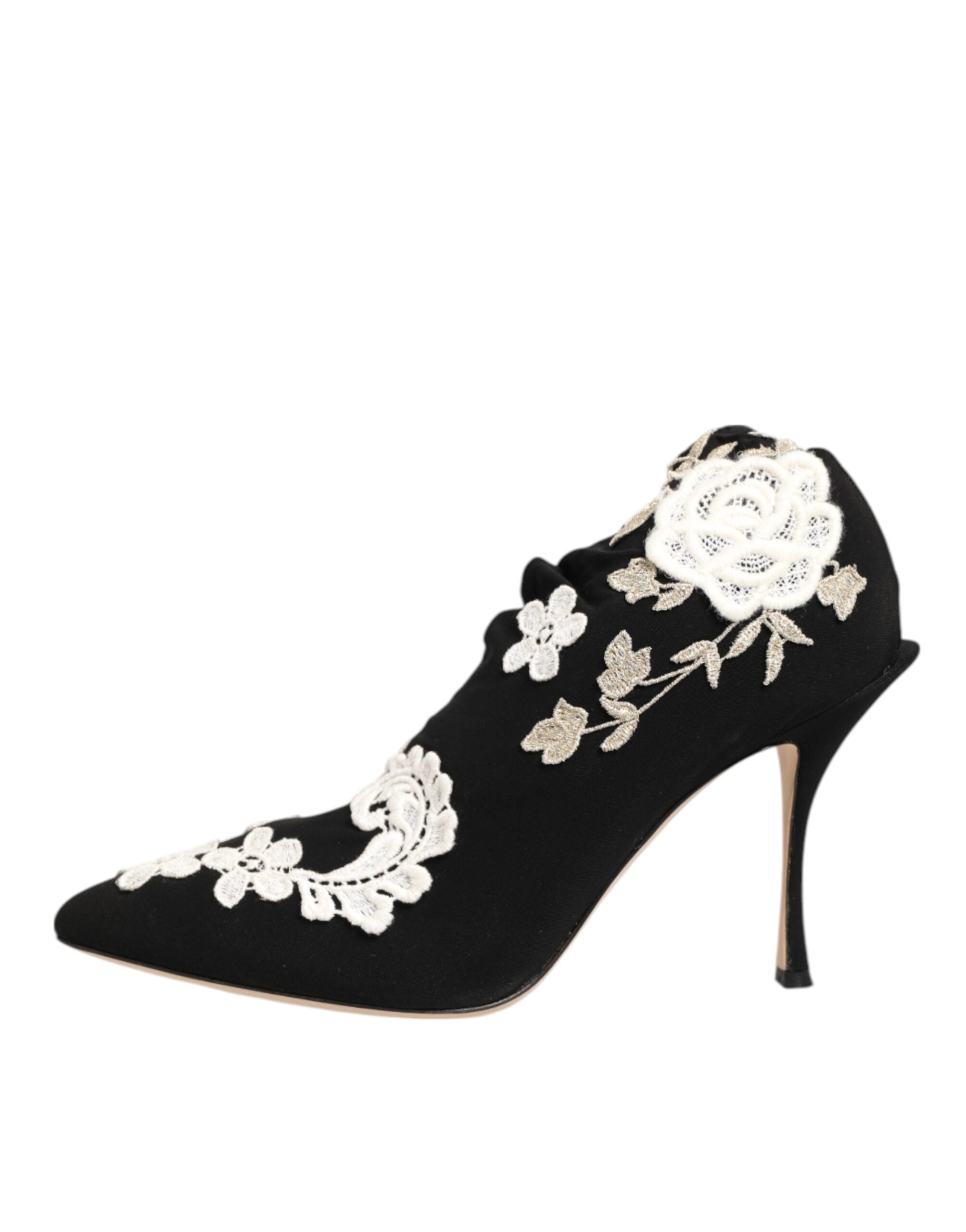 Bottes stilettos Dolce & Gabbana en jersey noir et blanc avec broderies élégantes et design sophistiqué.