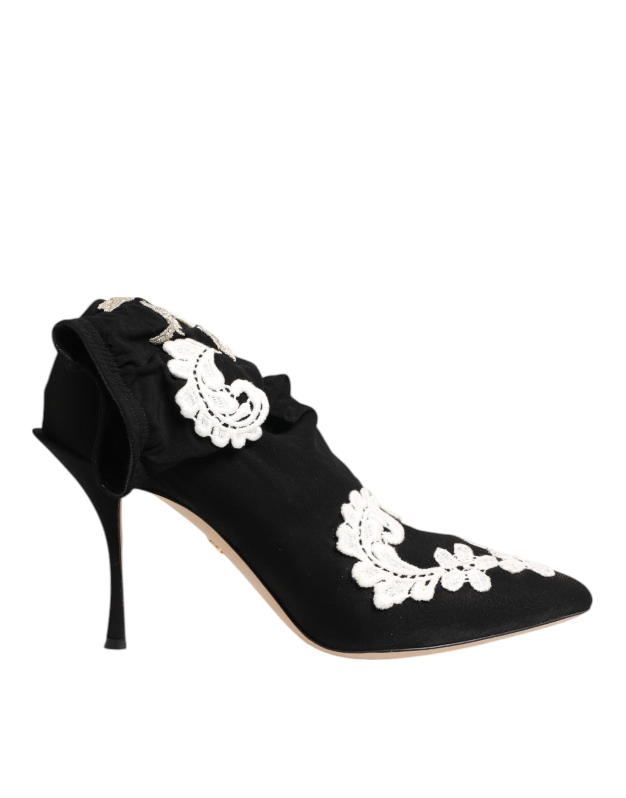 Bottes stilettos Dolce & Gabbana en jersey noir et blanc avec broderies élégantes, visibles en détail sur l'image.