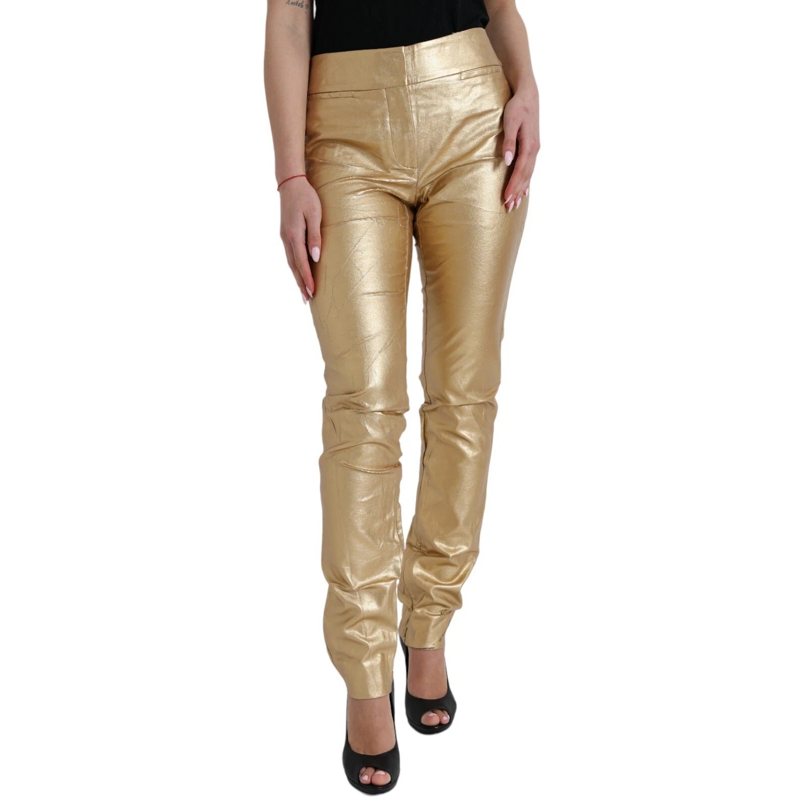 Pantalons métalliques dorés à taille haute pour femmes de Dolce & Gabbana, coupe skinny, finition brillante et élégante.