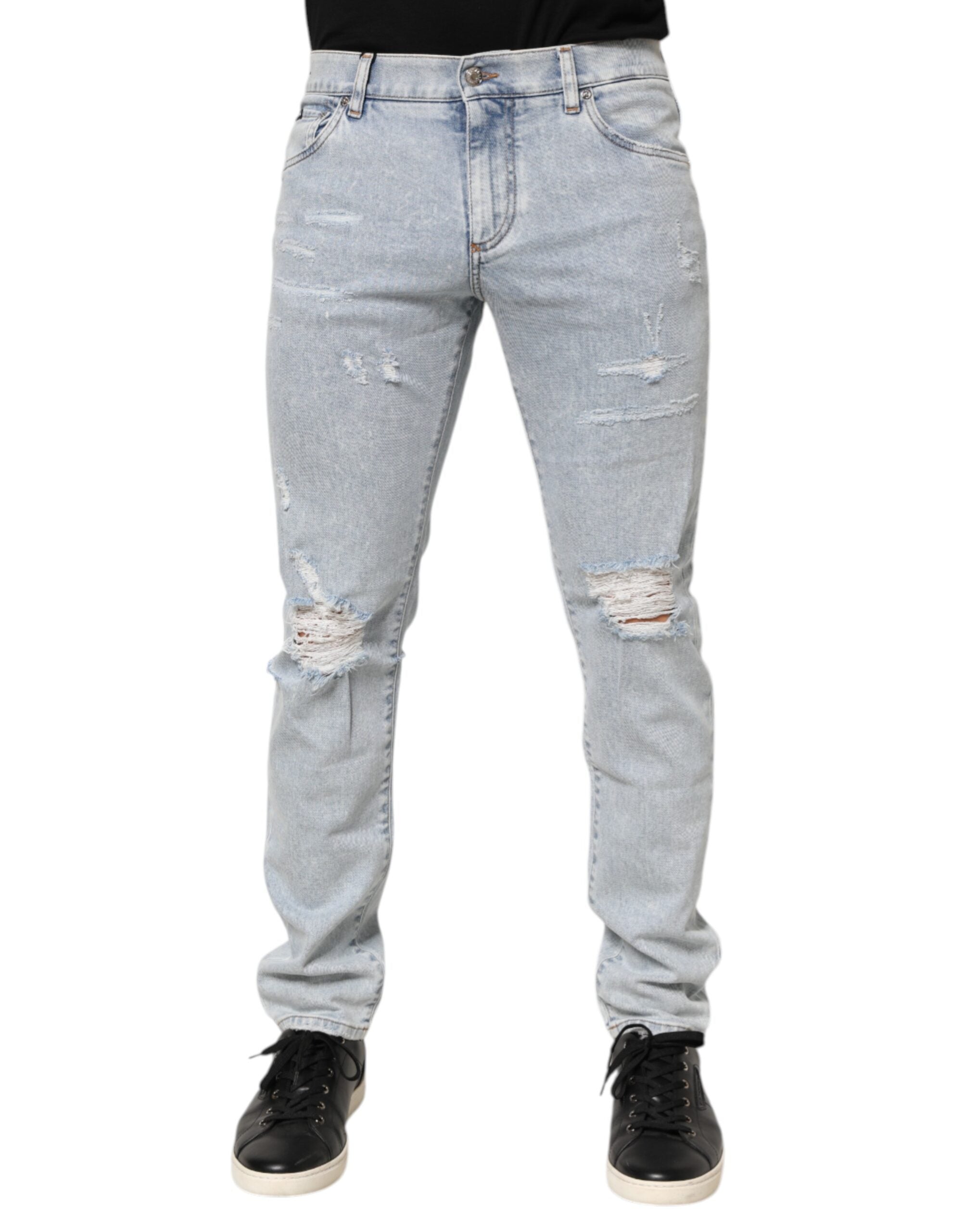 Jeans slim déchirés Dolce & Gabbana Light Blue en denim usé avec déchirures et style ajusté.