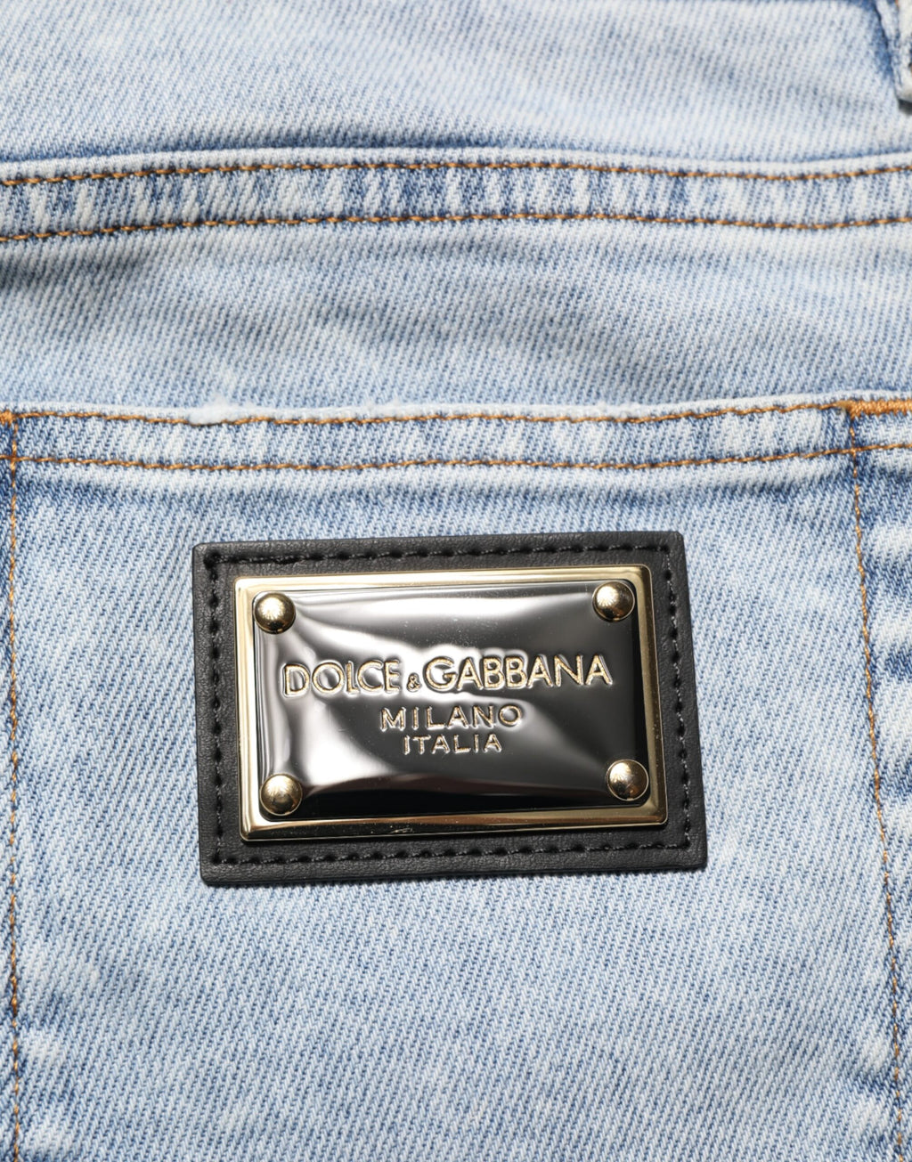 Jeans slim déchirés Dolce & Gabbana Light Blue en denim décontracté avec déchirures et style ajusté.