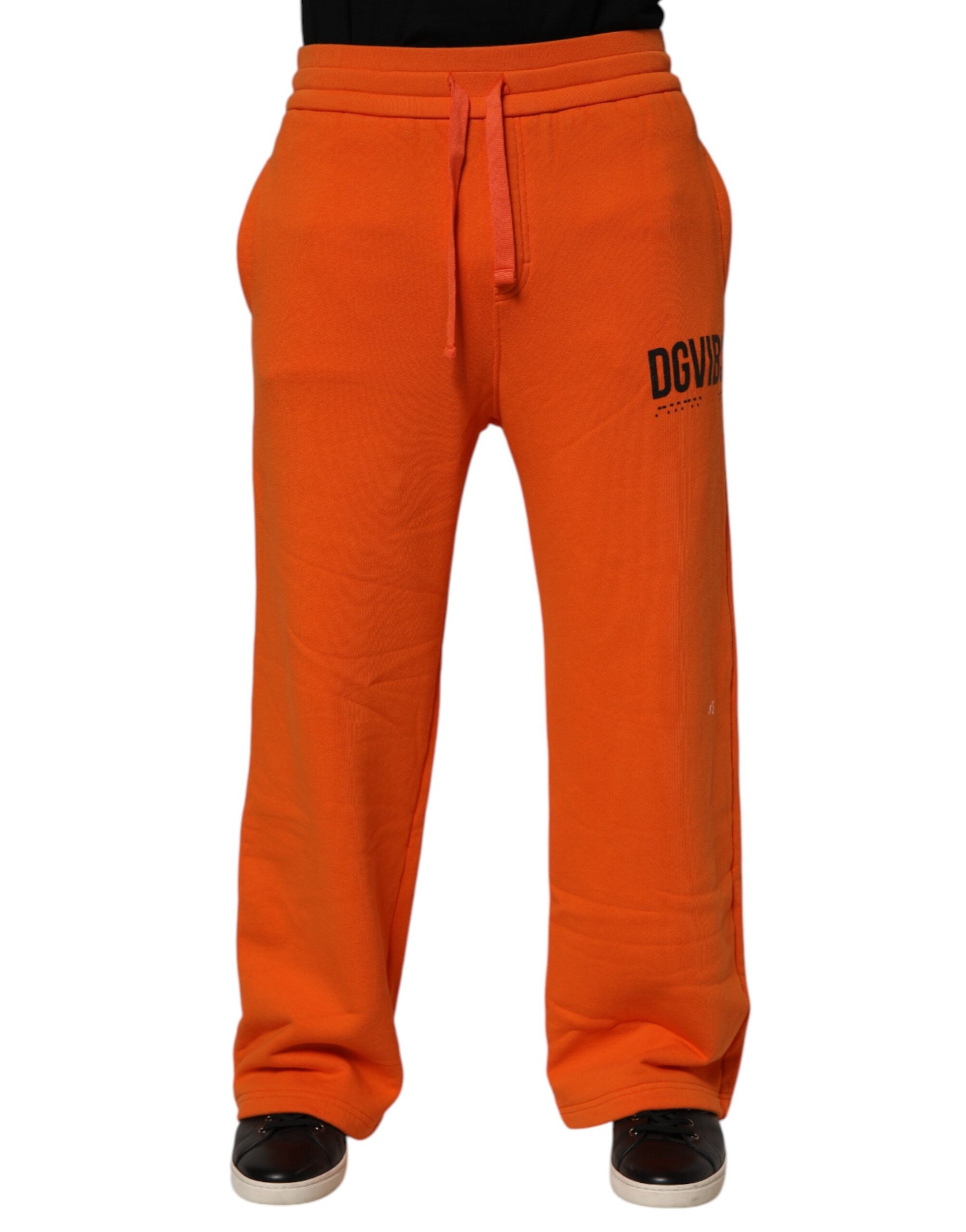 Pantalon de survêtement en coton orange Dolce & Gabbana DG VIB3 avec logo et cordons de serrage, vue de face.
