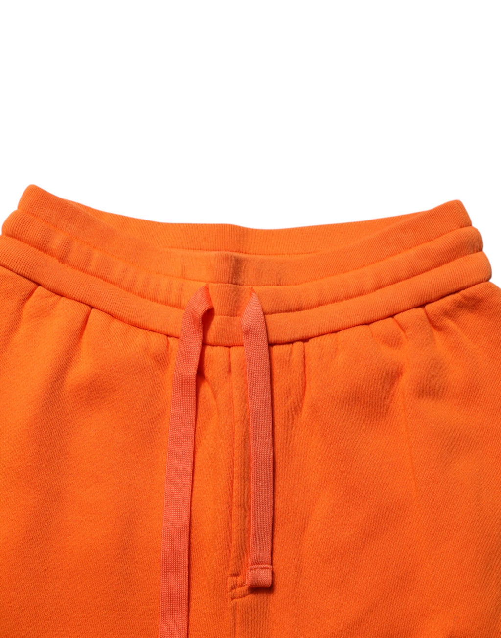 Pantalon de survêtement en coton orange Dolce & Gabbana DG VIB3 avec logo et cordons de serrage, vue de face.
