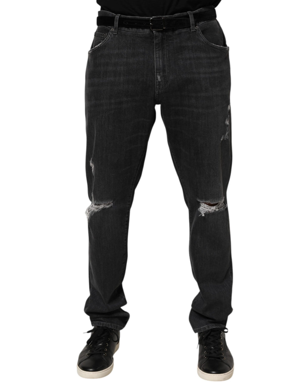 Jeans slim noir en coton Dolce & Gabbana avec déchirures, effet usé et logo visible, mode masculine élégante.