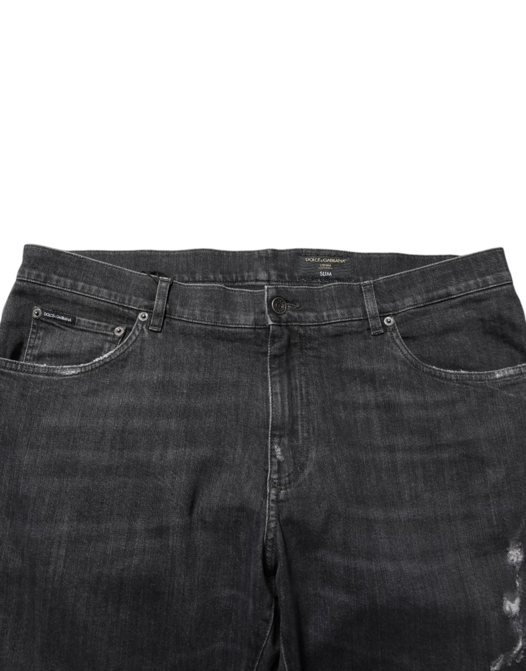 Jeans slim en coton noir Dolce & Gabbana avec déchirures, logo distressed, style décontracté et tendance.