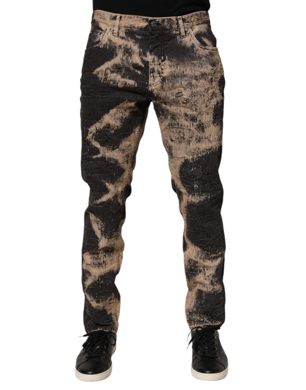 Pantalons Dolce & Gabbana en coton mélangé à rayures en velours côtelé beige et noir avec effet tie-dye, vue de face.
