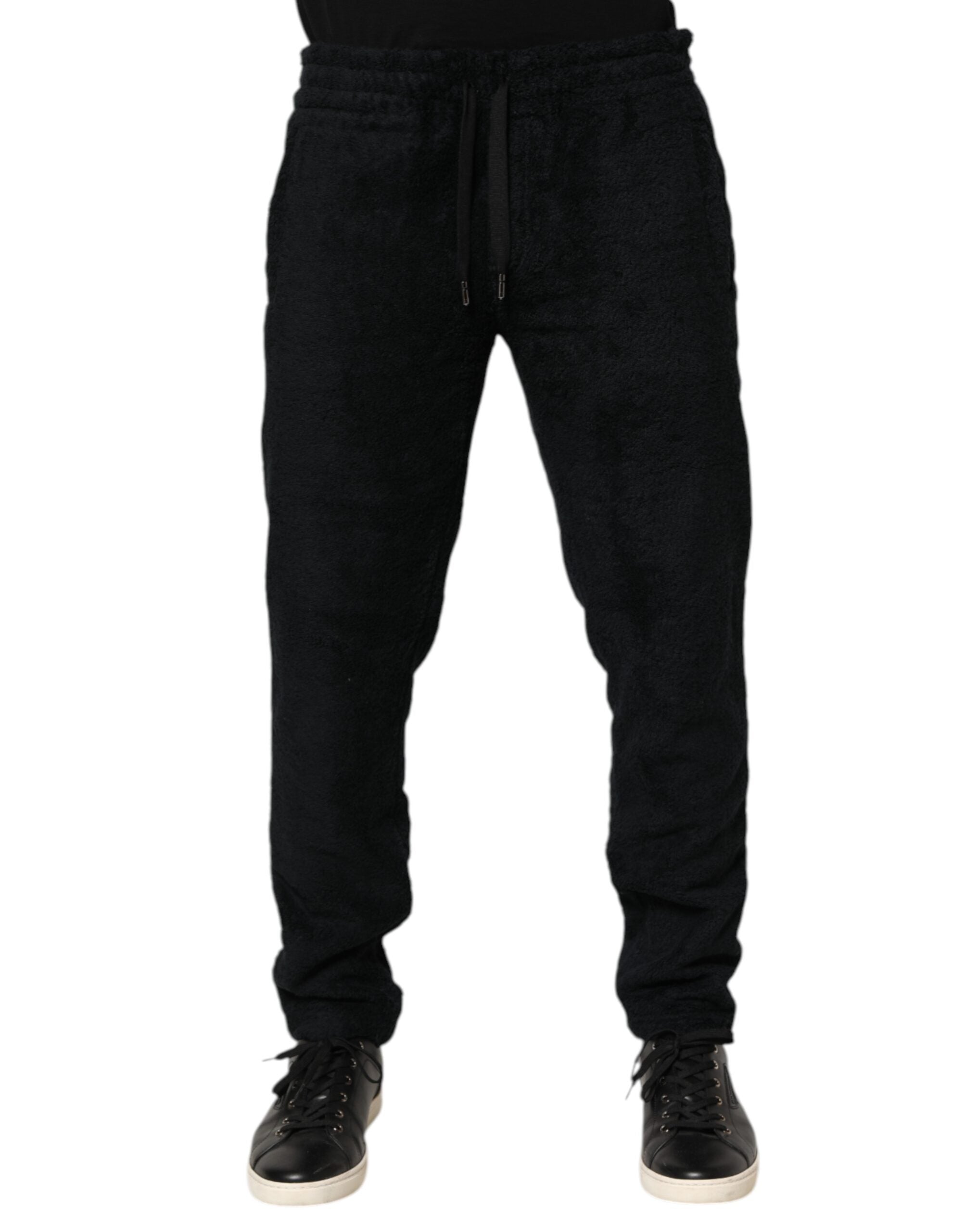 Pantalon de jogging homme Dolce & Gabbana en coton noir avec logo, style décontracté et confortable.