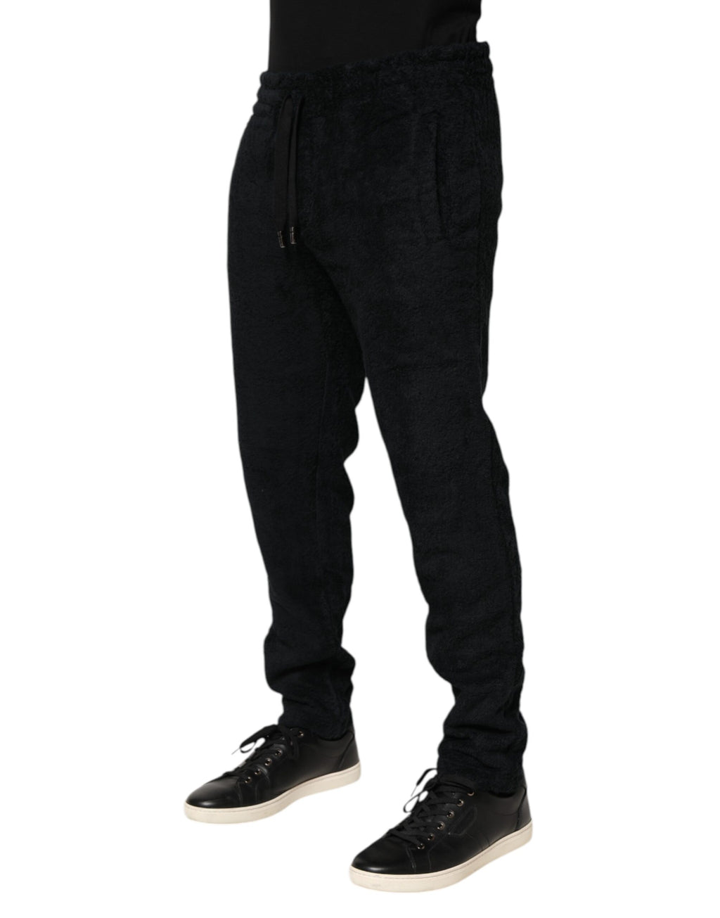 Pantalon jogger homme Dolce & Gabbana en coton noir avec logo, coupe décontractée et style sportif.