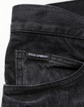 Jeans skinny en denim noir en coton délavé de Dolce & Gabbana pour homme, coupe ajustée et style moderne.