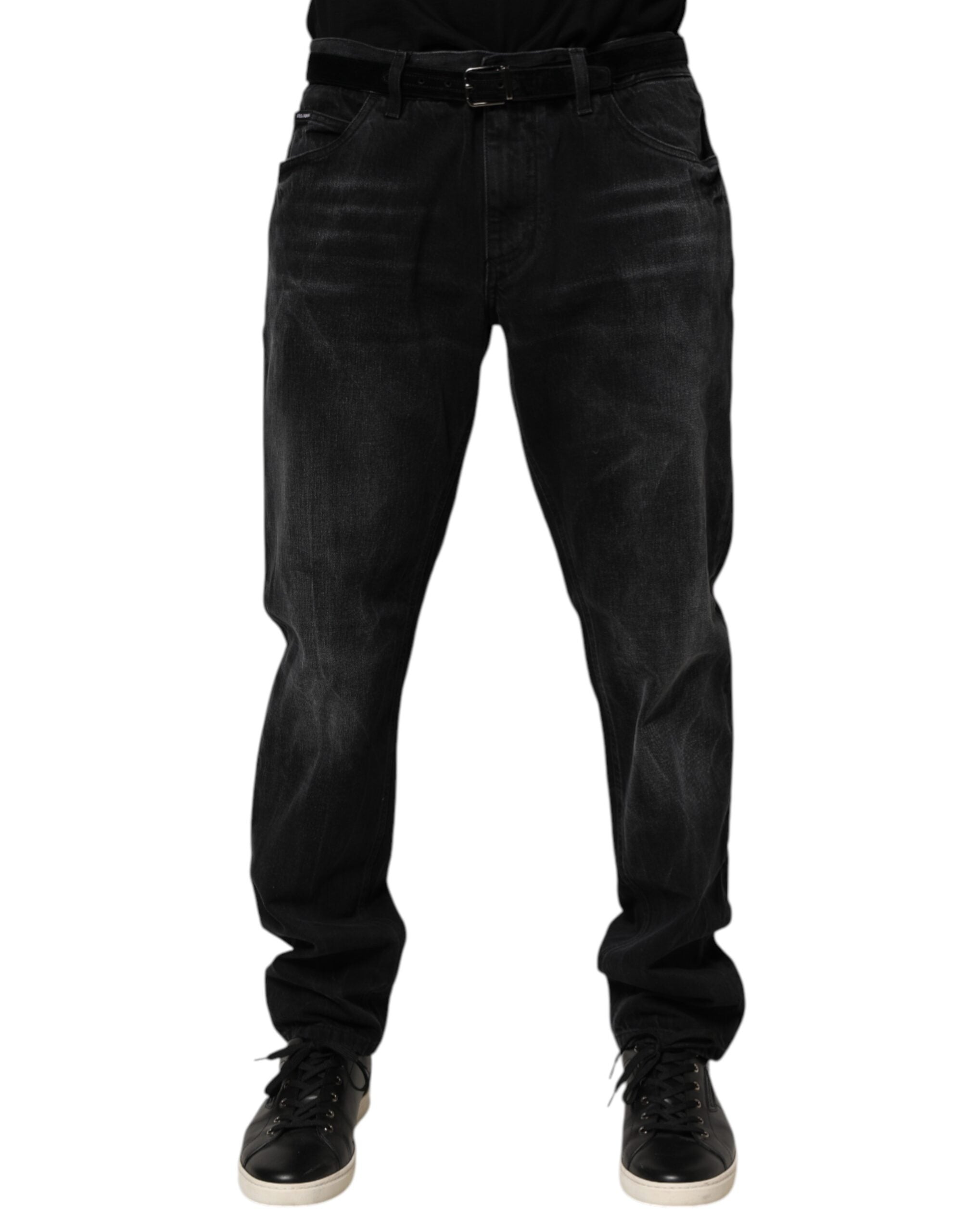 Jean homme skinny en coton délavé noir de Dolce & Gabbana, coupe ajustée et détails modernes visibles sur l'image.