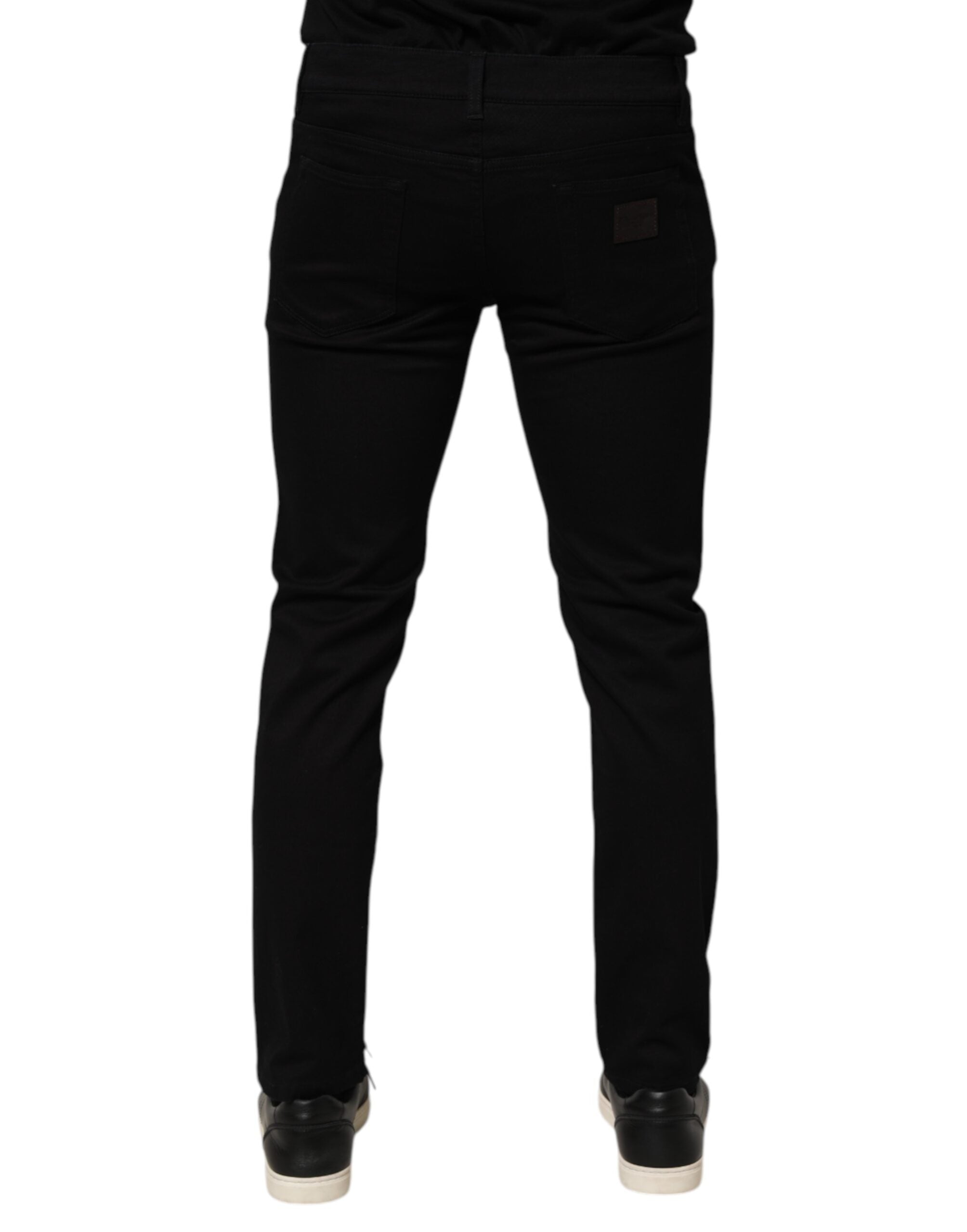 Pantalon homme skinny en coton mélangé noir de Dolce & Gabbana, style élégant et ajusté, vue en gros plan sur la jambe.