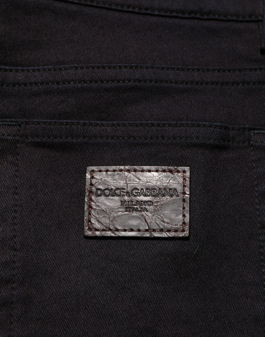 Pantalon slim homme Dolce & Gabbana en coton mélangé noir, coupe ajustée et élégante, visible sur l'image.