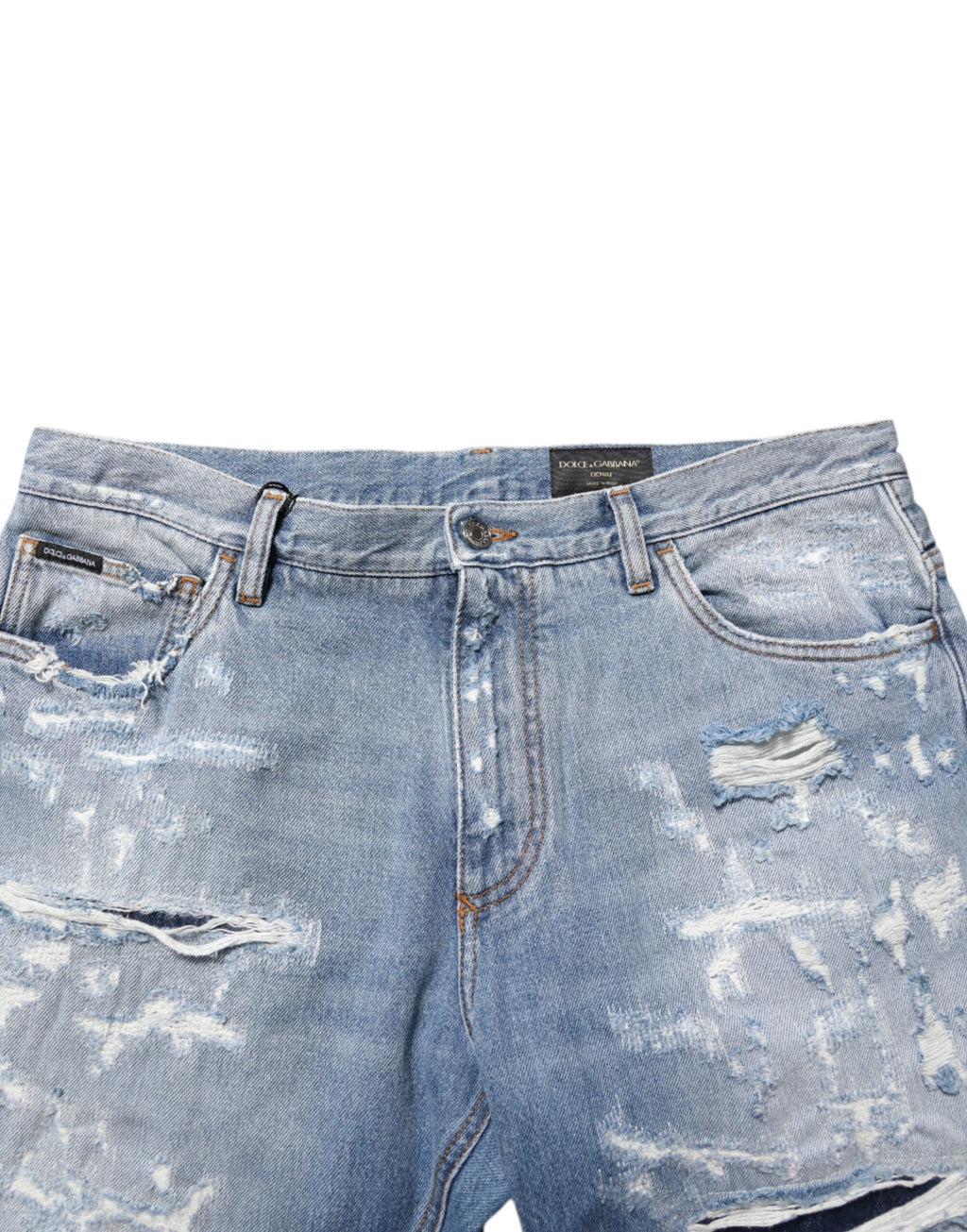 Pantalons en jean déchirés bleu Dolce & Gabbana, style décontracté avec déchirures et délavé, coupe classique pour homme ou femme.