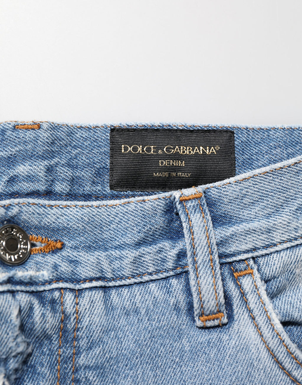 Pantalon en jean bleu déchiré et usé de Dolce & Gabbana, style décontracté avec détails déchirés et finition délavée.