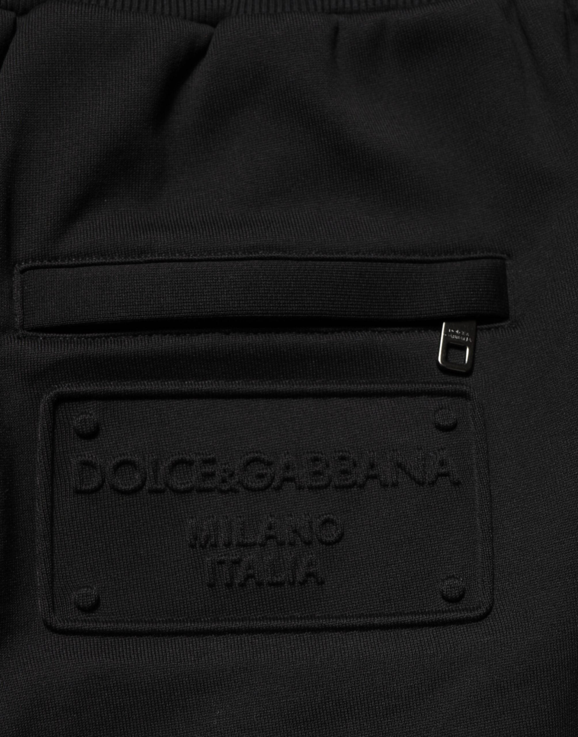 Pantalons de survêtement noirs en coton Dolce & Gabbana avec cordon de serrage et logo, confort et style décontracté.