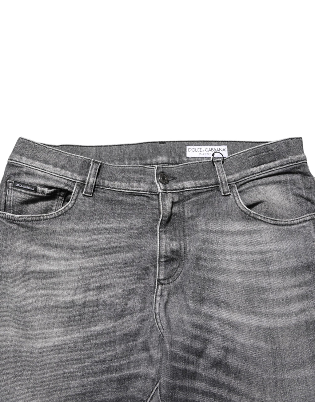 Pantalons slim en denim gris en coton Dolce & Gabbana avec déchirures et style décontracté, visibles sur l'image.