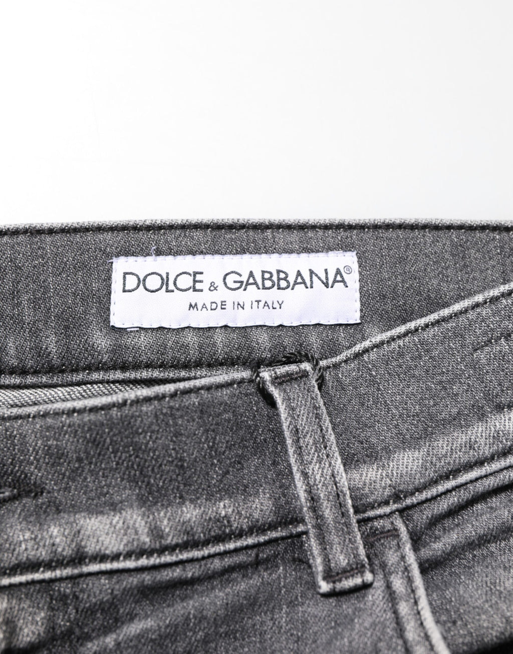 Pantalons jeans slim fit en denim gris en coton de Dolce & Gabbana, style décontracté avec détails usés.