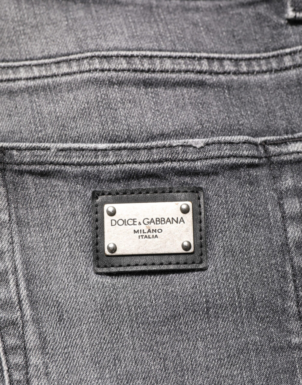 Pantalon slim en jean en coton gris de Dolce & Gabbana, style déchiré et tendance, ajusté et confortable.