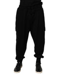 Pantalon cargo jogger en coton mélangé noir Dolce & Gabbana avec cordon de serrage, style décontracté et moderne.
