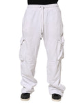 Pantalons cargo en coton blanc Dolce & Gabbana avec patch logo, vue de face.