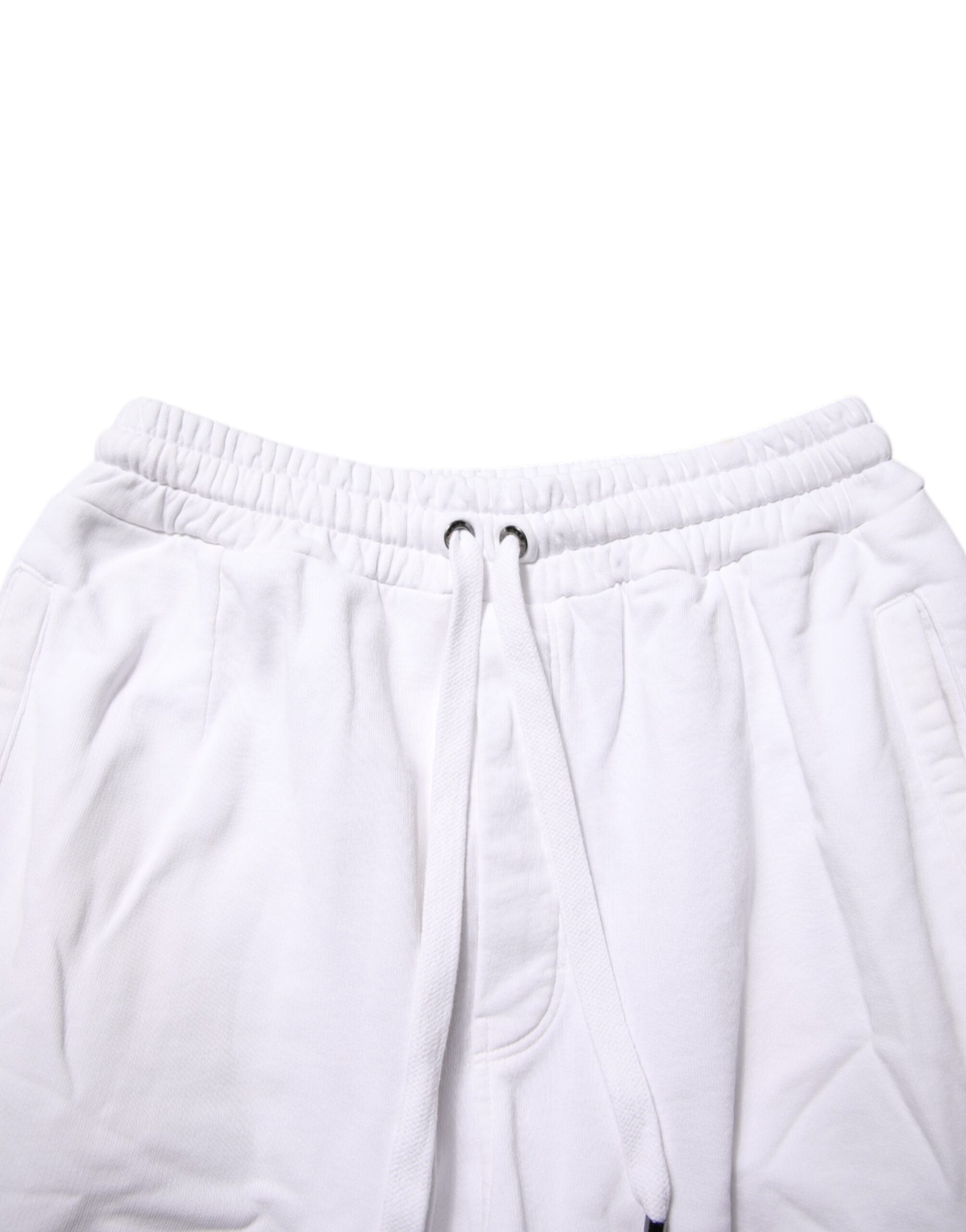 Pantalons cargo en coton blanc Dolce & Gabbana avec patch logo, détails modernes et style décontracté.