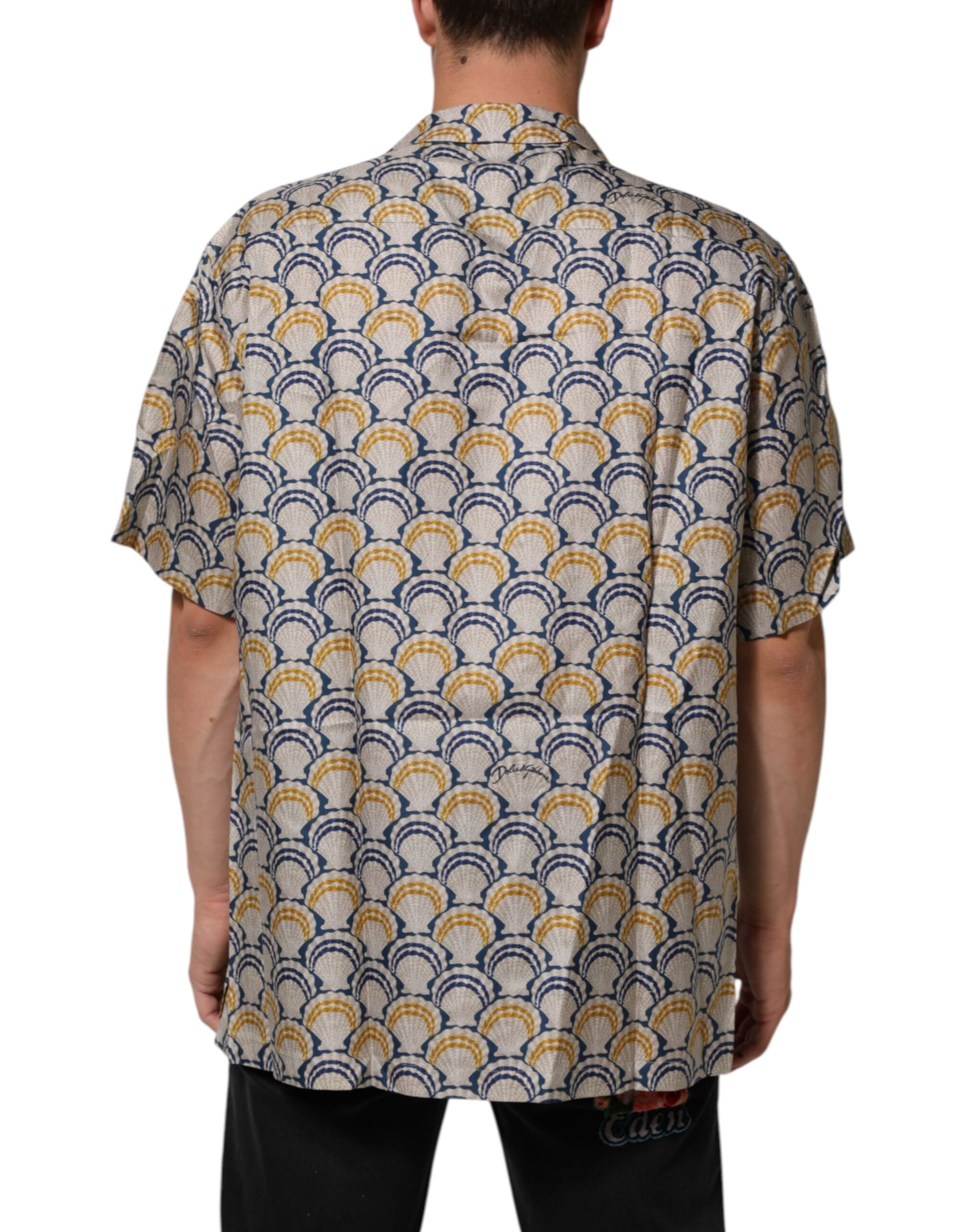 Chemise Dolce & Gabbana en coton et soie avec motif coquillage Hawaii à bord scallop, élégante et légère.